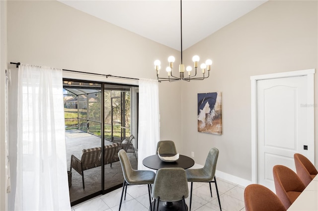 tiled dining area with an inviting chandelier and high vaulted ceiling