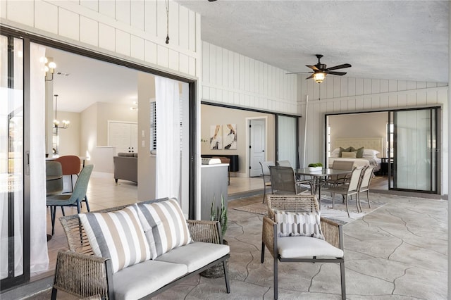 view of patio / terrace with an outdoor hangout area and ceiling fan