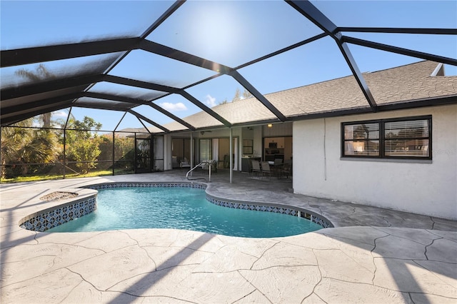 view of pool featuring a lanai and a patio area