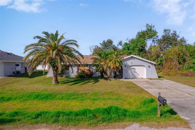 view of front facade with cooling unit, a garage, and a front lawn