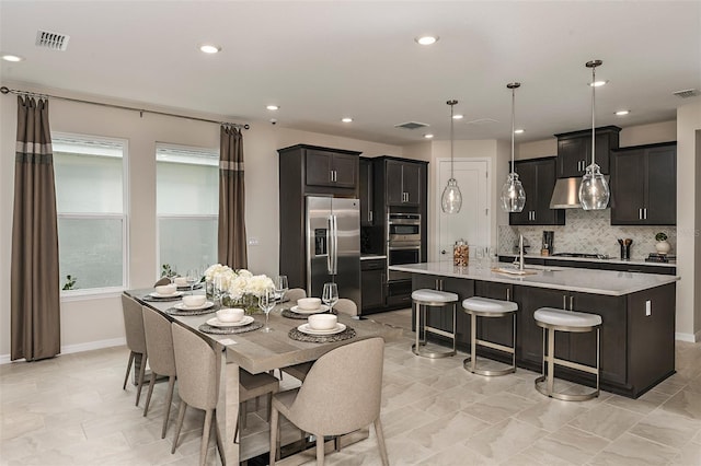 dining space with sink