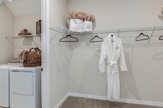 spacious closet featuring carpet and washing machine and clothes dryer