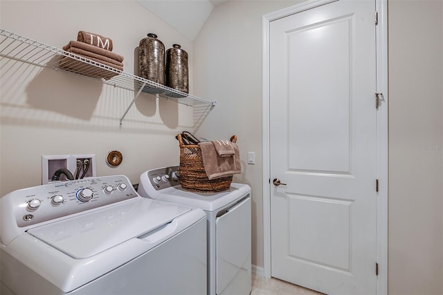 washroom featuring independent washer and dryer