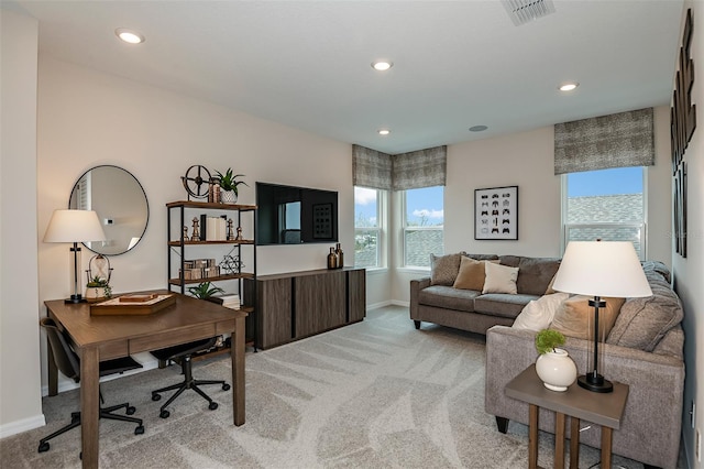 office featuring light carpet and a wealth of natural light