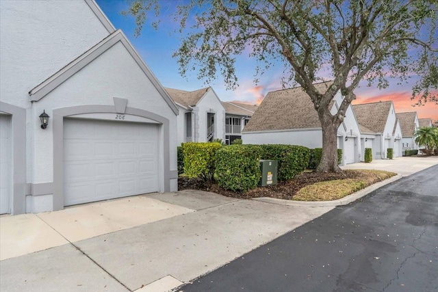 view of front of home with a garage