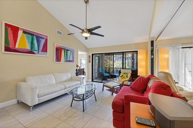 living room featuring ceiling fan, light tile patterned flooring, and high vaulted ceiling