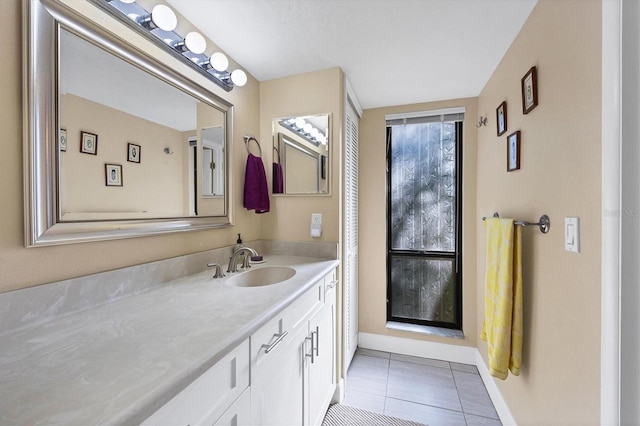 bathroom featuring vanity and tile patterned floors