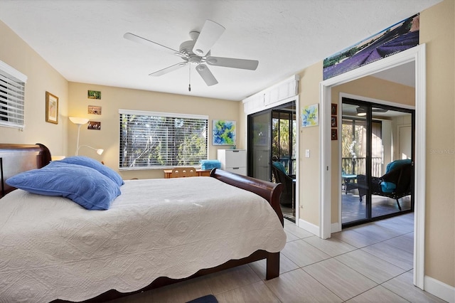 tiled bedroom with multiple windows, access to exterior, and ceiling fan