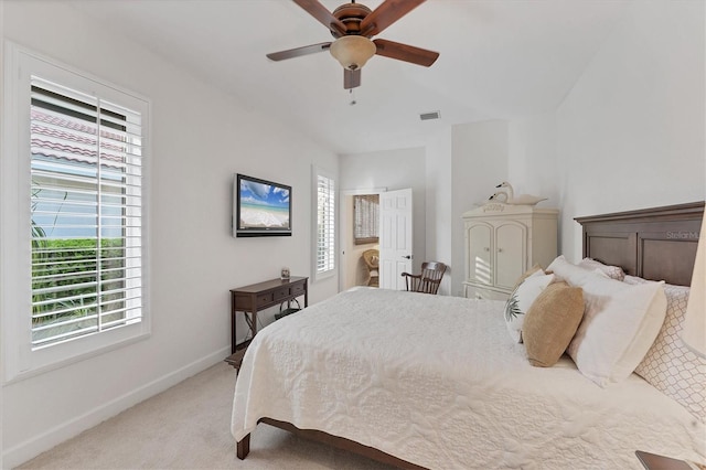 bedroom featuring visible vents, ceiling fan, light carpet, and baseboards