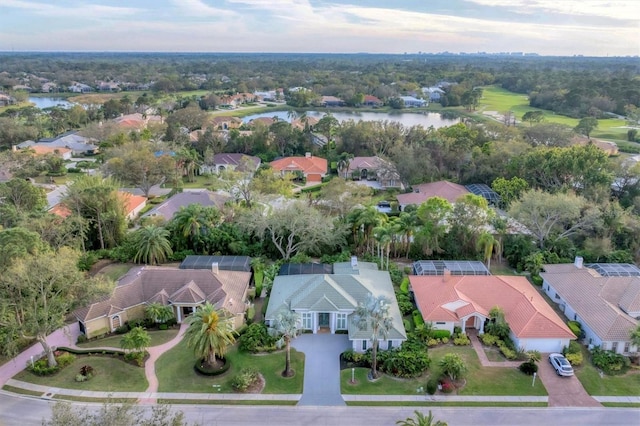 aerial view featuring a residential view and a water view