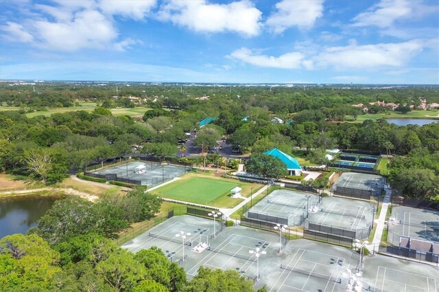 bird's eye view featuring a water view and a wooded view