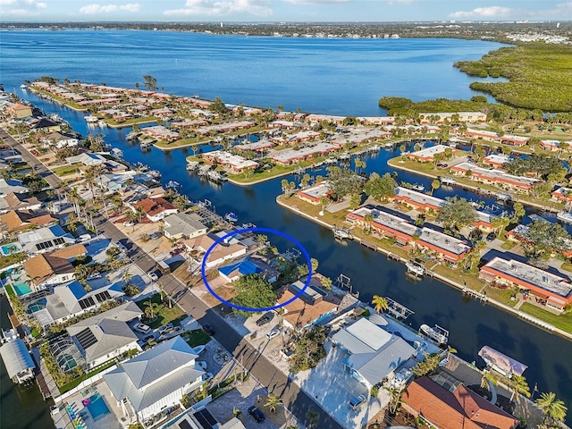 bird's eye view with a water view