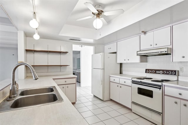 kitchen with white cabinetry, white appliances, sink, and pendant lighting