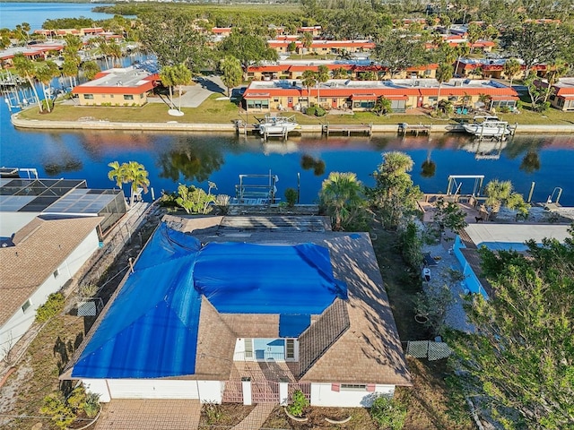 birds eye view of property featuring a water view