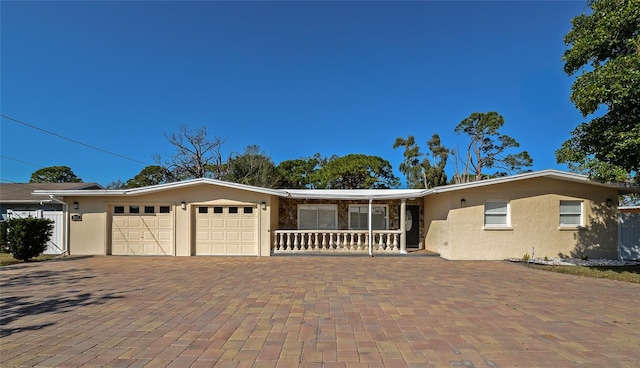 single story home with a garage