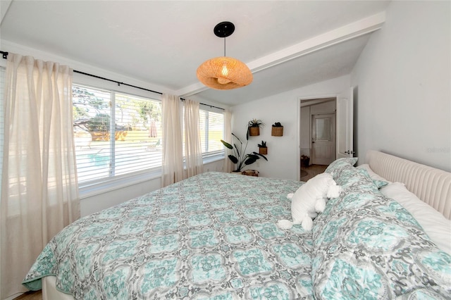 bedroom featuring vaulted ceiling