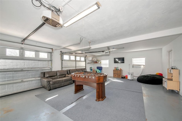 game room with concrete flooring