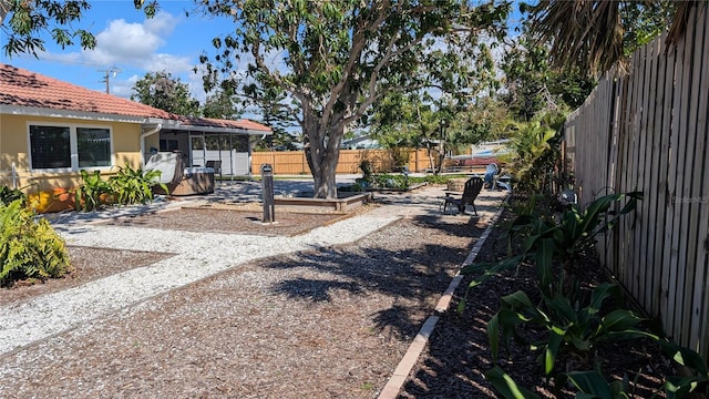 view of yard with a patio and a fenced backyard