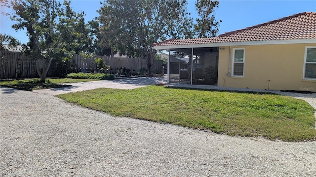 view of yard with a patio and fence