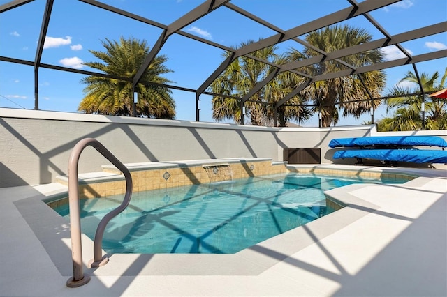 view of pool featuring glass enclosure