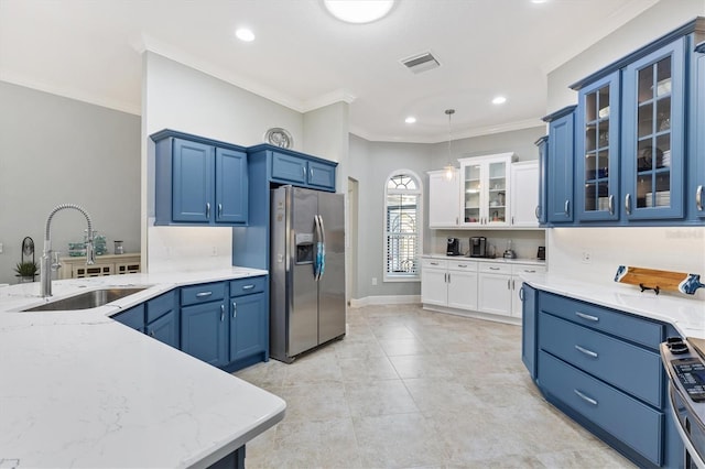 kitchen featuring decorative light fixtures, sink, light stone counters, stainless steel fridge with ice dispenser, and crown molding