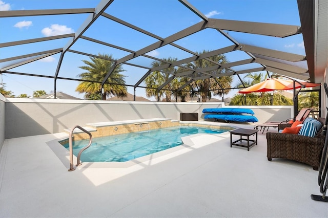 view of pool featuring a patio and glass enclosure