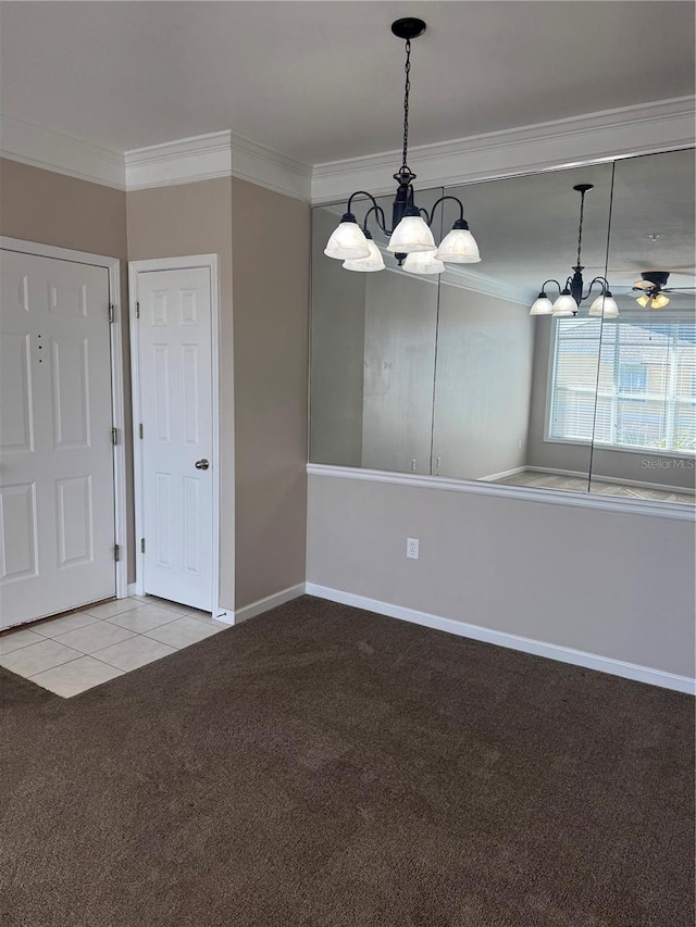 spare room with light carpet, a notable chandelier, and crown molding