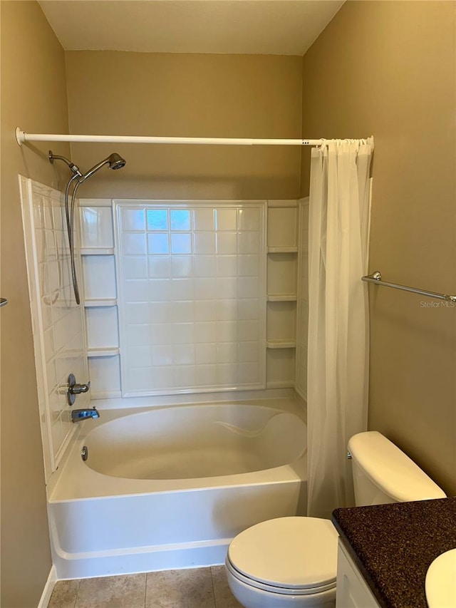 full bathroom with vanity, shower / tub combo, tile patterned flooring, and toilet