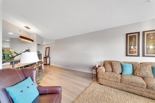 living room with light hardwood / wood-style floors