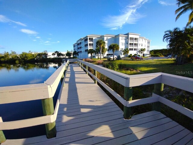 dock area with a water view