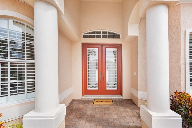 property entrance featuring french doors