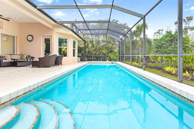 outdoor pool with a lanai, an outdoor living space, and a patio