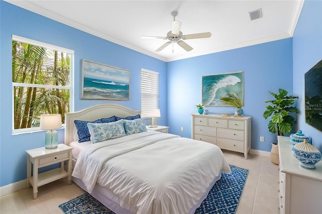 bedroom featuring light tile patterned floors, baseboards, visible vents, a ceiling fan, and ornamental molding