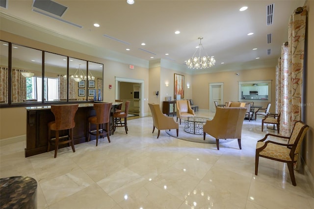 dining room with crown molding, indoor bar, and a chandelier