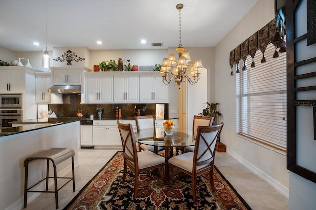 dining space featuring light tile patterned floors, recessed lighting, visible vents, baseboards, and an inviting chandelier