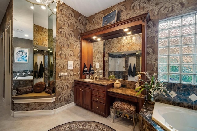 full bathroom featuring wallpapered walls, tile patterned floors, a wealth of natural light, and vanity