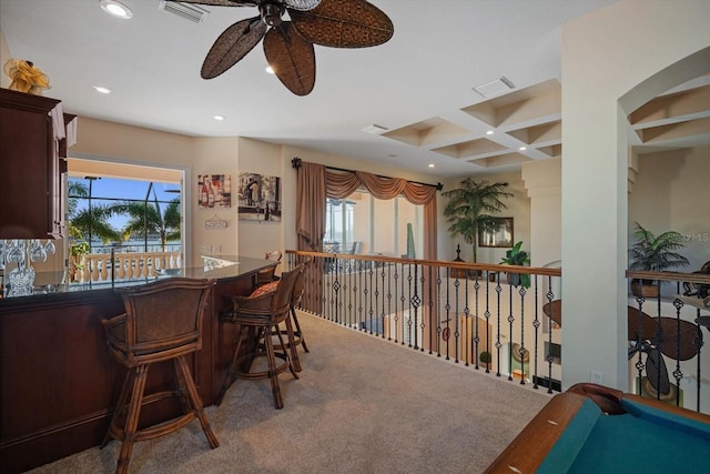 bar featuring carpet floors, coffered ceiling, visible vents, and recessed lighting