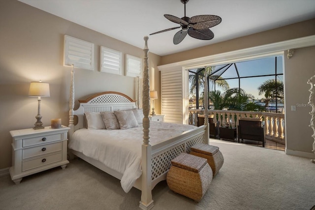 bedroom featuring access to outside and light carpet