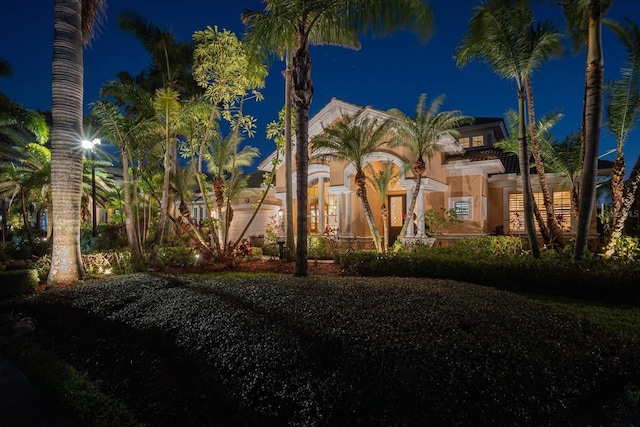 view of front of home featuring stucco siding