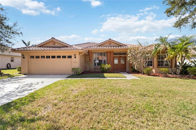 view of front of home featuring a garage and a front lawn