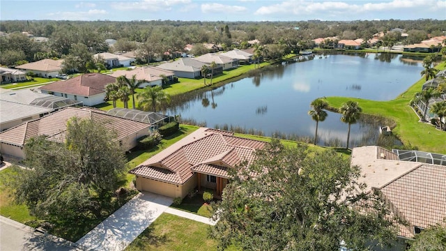 drone / aerial view featuring a water view