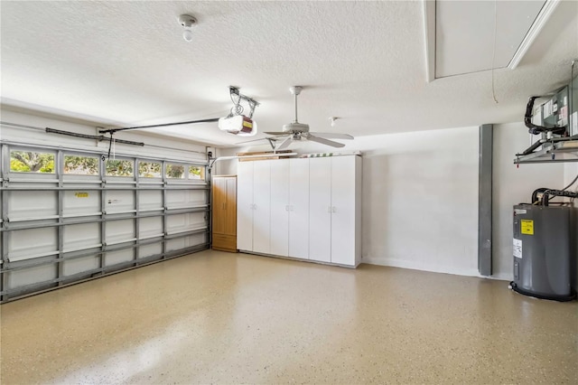 garage with a garage door opener and electric water heater