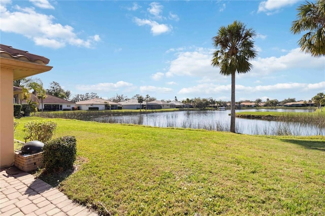 view of yard with a water view