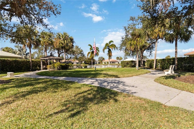 view of home's community featuring a gazebo and a yard