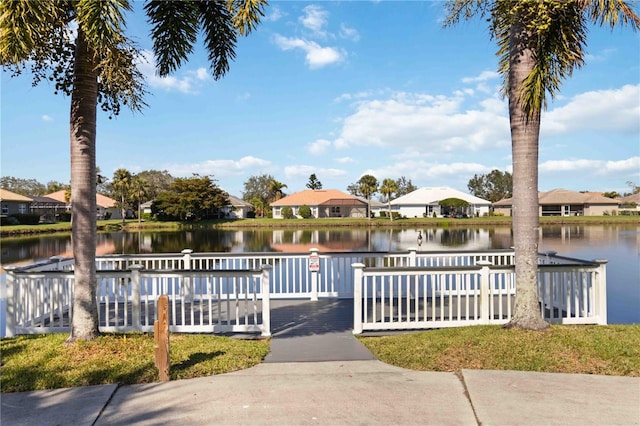 exterior space with a water view