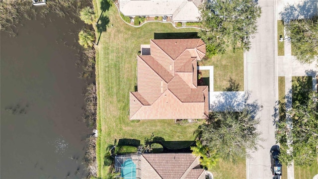 drone / aerial view featuring a water view