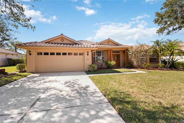 view of front facade featuring a garage and a front lawn