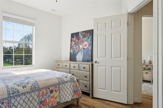 bedroom featuring light wood-type flooring