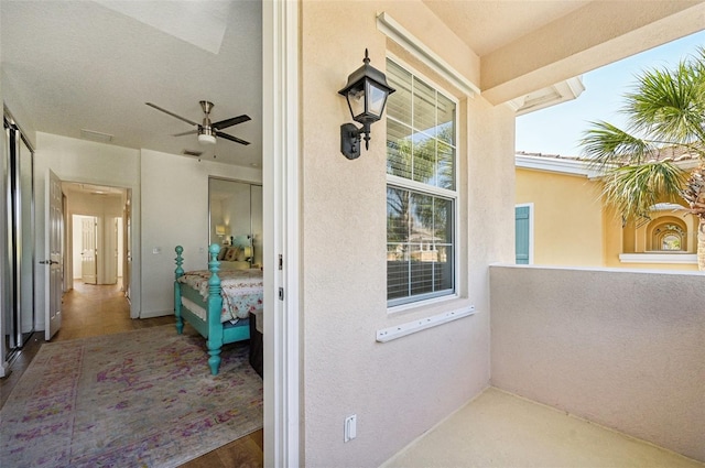 balcony featuring ceiling fan