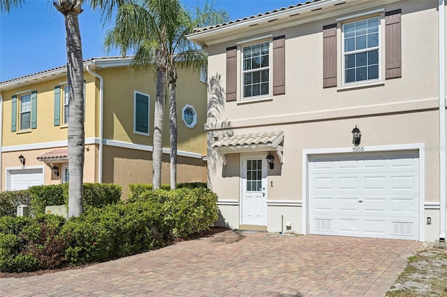 view of front of property with a garage